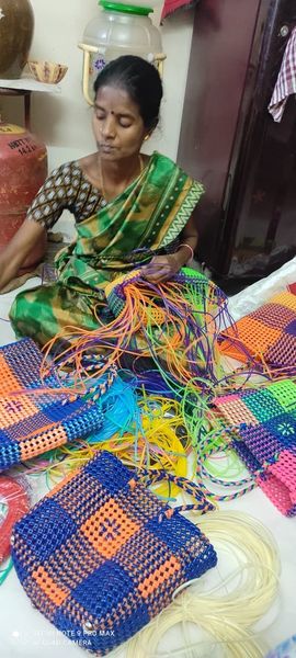 Sindhu Deebam SHG member Mrs. Kasthuri Prepare Voyar Bag