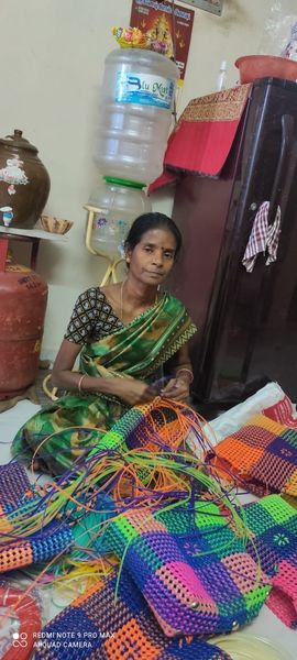 Sindhu Deebam SHG member Mrs. Kasthuri Prepare Voyar Bag