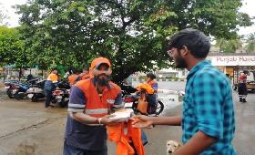 Day -4 During heavy flood in Chennai. 300 Food Pockets were provided at Power House, Aruvathu Kudisai, Rangarajapuram, Kodambakkam  Under Bridge 7& so on.