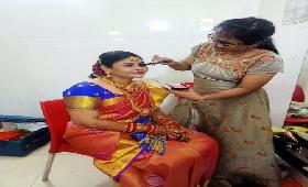 Sindhuja SHG Animator Mrs. Janaki is doing Wedding Makeup