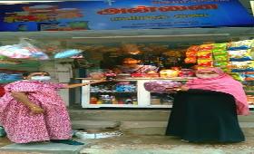 Annai Indra SHG member Mrs.Jothi and Mrs.Usha runs grocery shop.